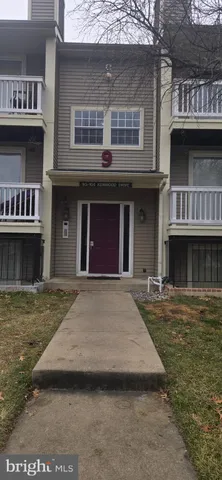 a front view of a house with yard