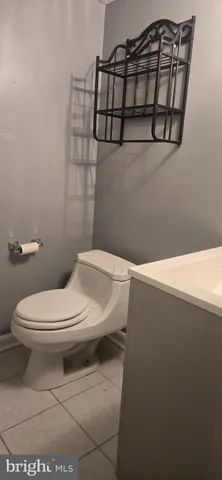 a bathroom with a toilet and a sink
