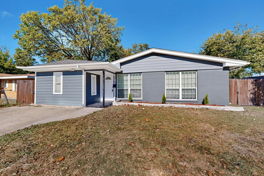 2519 Maverick Avenue Dallas, TX 75228 - Photo 1 of 31 a front view of a house with a garden