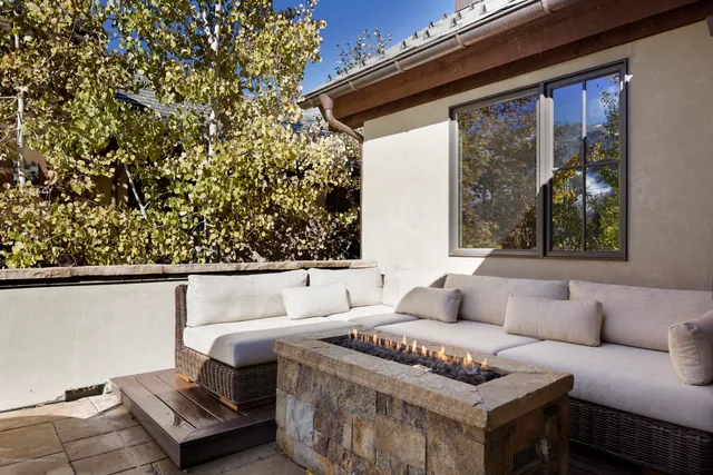 an aerial view of a house with a garden
