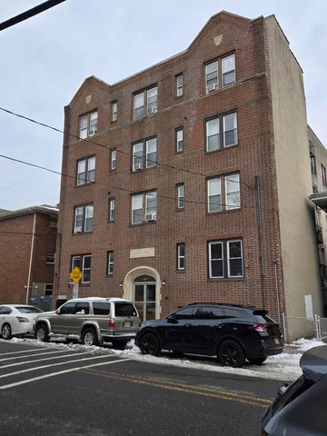 a view of street with parked cars