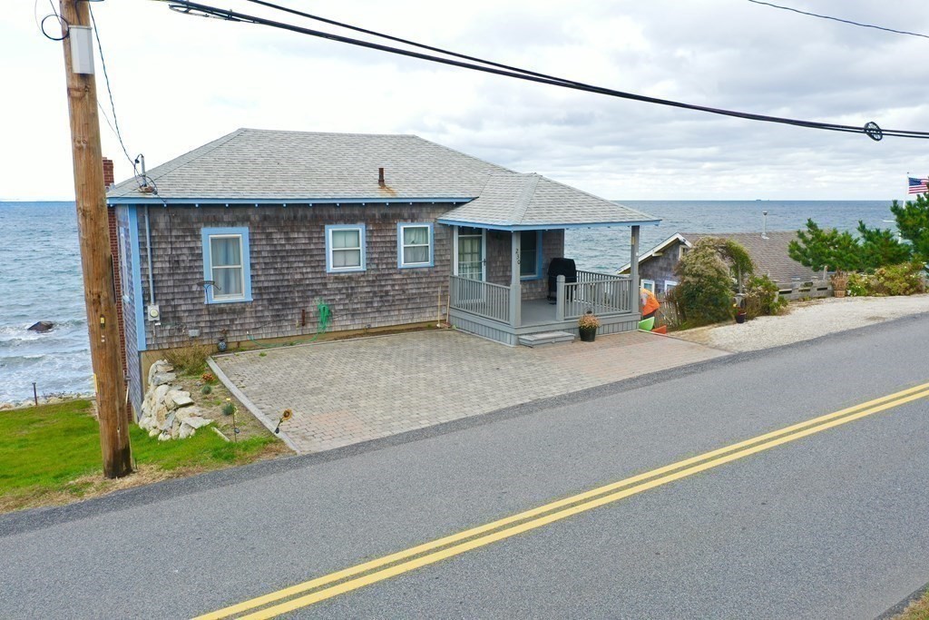 230 Manomet Point Road Plymouth, MA 02360 - Photo 3 of 15 a view of a house with a swimming pool