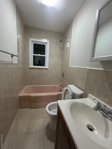 a bathroom with a sink and a bathtub