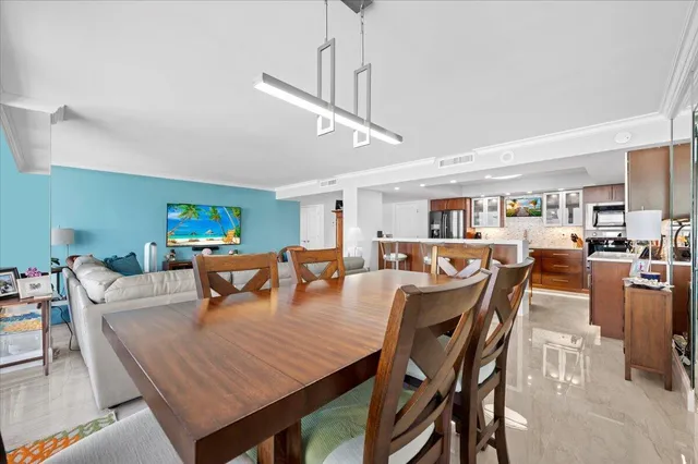 a view of a dining room with furniture