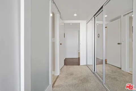 a view of hallway with yard and hallway