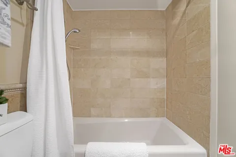 a bathroom with a bathtub