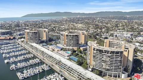 a view of a city with tall buildings
