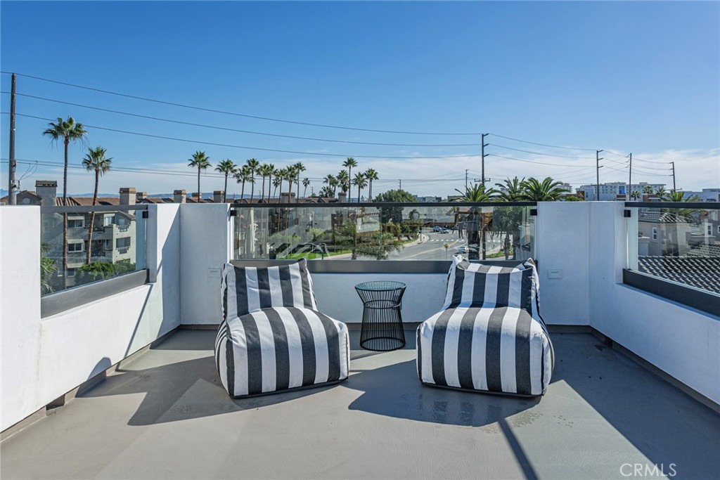 328 3rd Street Huntington Beach, CA 92648 - Photo 31 of 42 a view of balcony with furniture