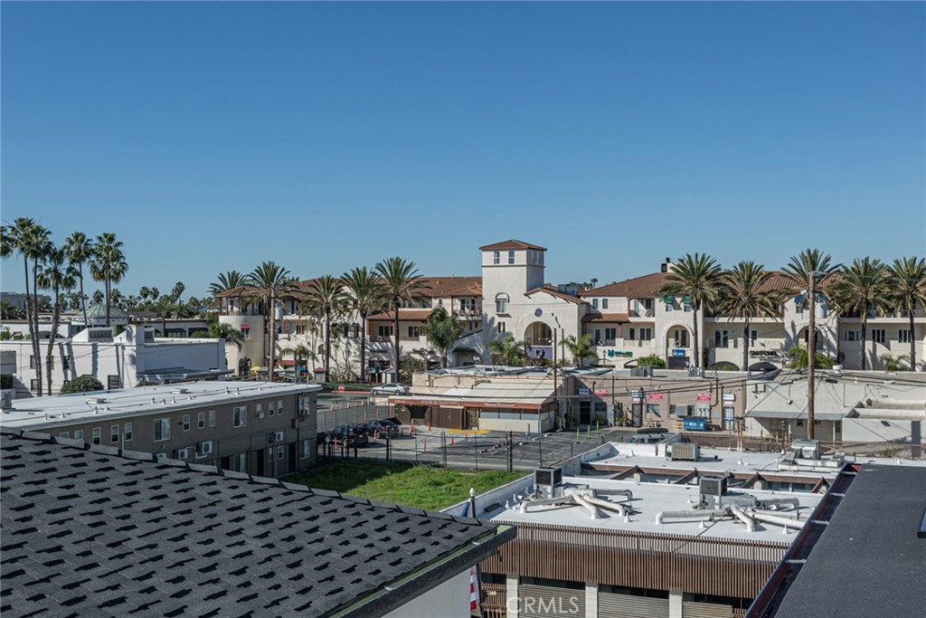 328 3rd Street Huntington Beach, CA 92648 - Photo 34 of 42 a view of a chairs and table in the terrace