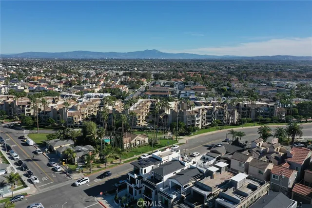 an aerial view of a city with lots of residential buildings