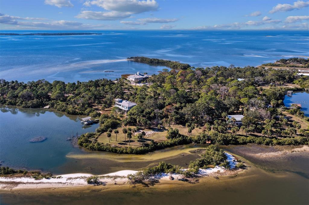 136 Southwest Sw Place Cedar Key, FL 32625 - Photo 2 of 13 a view of a city and ocean