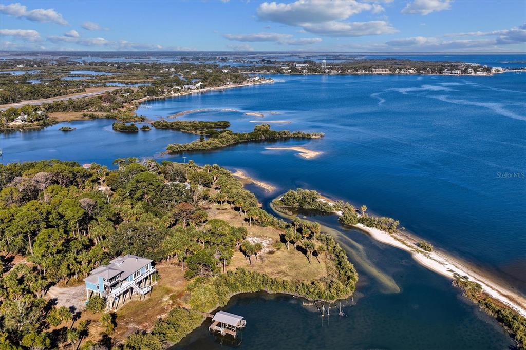 136 Southwest Sw Place Cedar Key, FL 32625 - Photo 5 of 13 an aerial view of ocean and residential houses with outdoor space