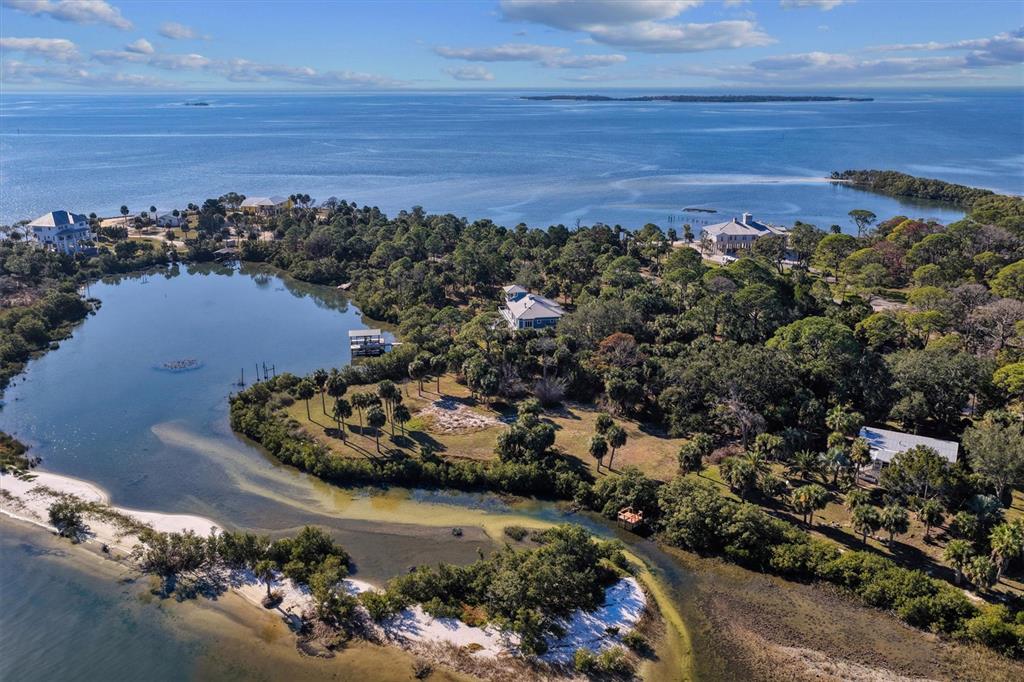 136 Southwest Sw Place Cedar Key, FL 32625 - Photo 10 of 13 a view of a city and ocean view