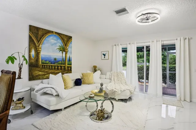 a kitchen with a sink and a window