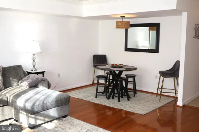 a bedroom with a bed and a table in it