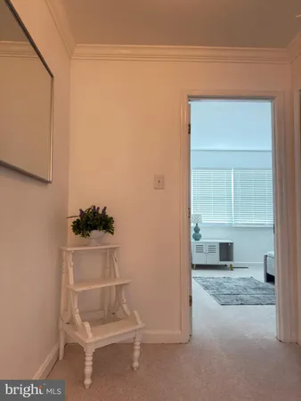 a house that has a window and a wooden door