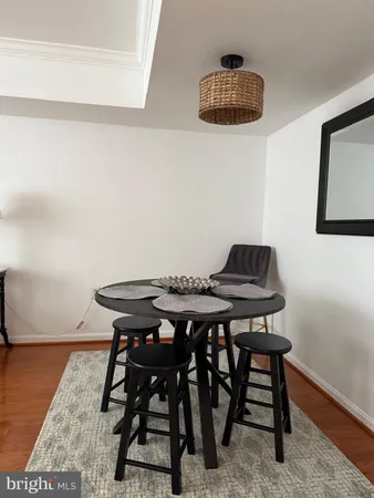 a view of a workspace with furniture