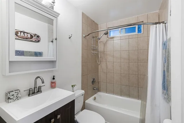a bathroom with a sink and a bathtub