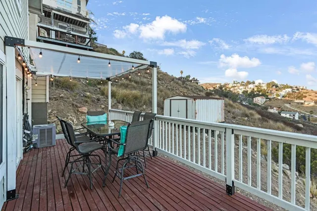 a view of a chairs on the roof deck
