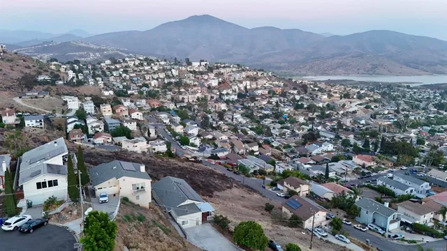 an aerial view of residential house and green space