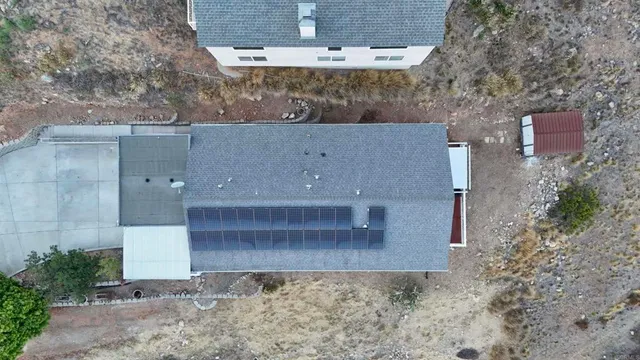 a view of a big house with a yard