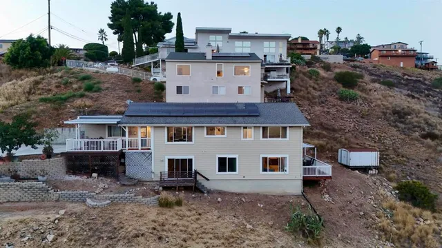 a white building with a clock tower in the middle