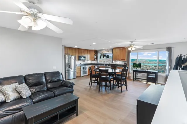 a view of a dining room with furniture window and outside view
