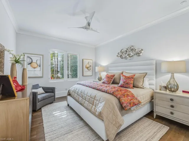 a bathroom with a granite countertop sink mirror vanity and toilet
