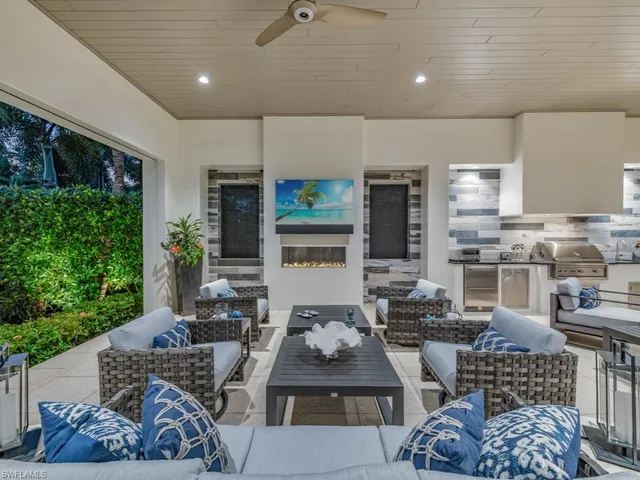 a kitchen with a table and chairs