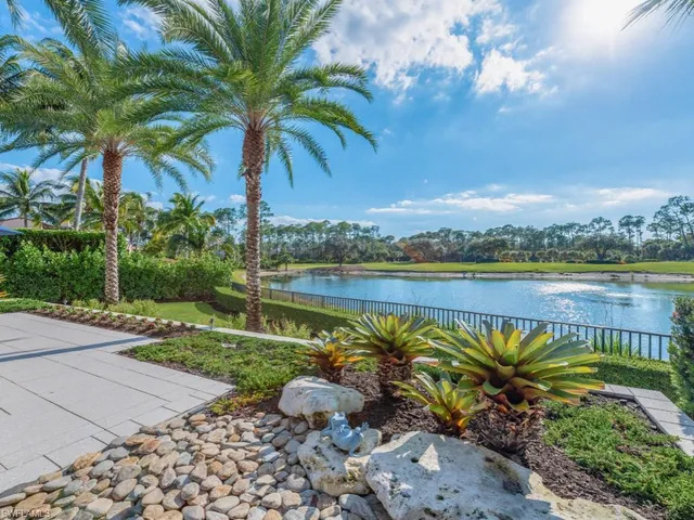 an aerial view of a house having yard swimming pool and outdoor seating
