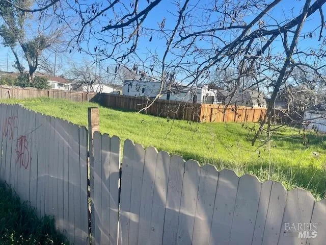 a view of a wooden fence