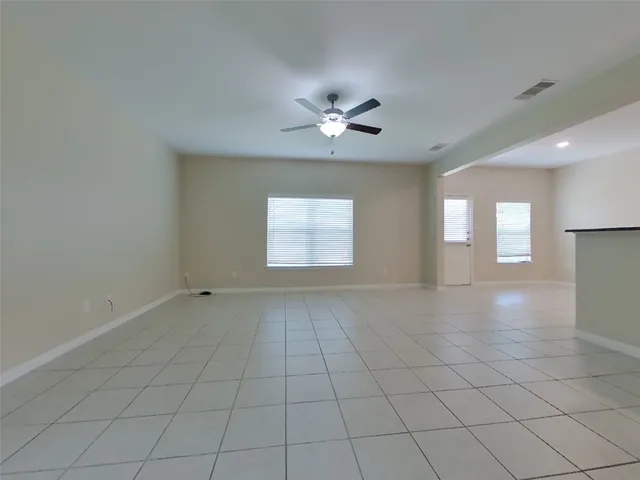 a view of an empty room and window