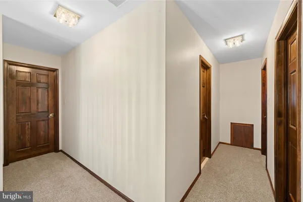 an empty room with large window