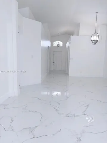 a view of a room with rack on the wall