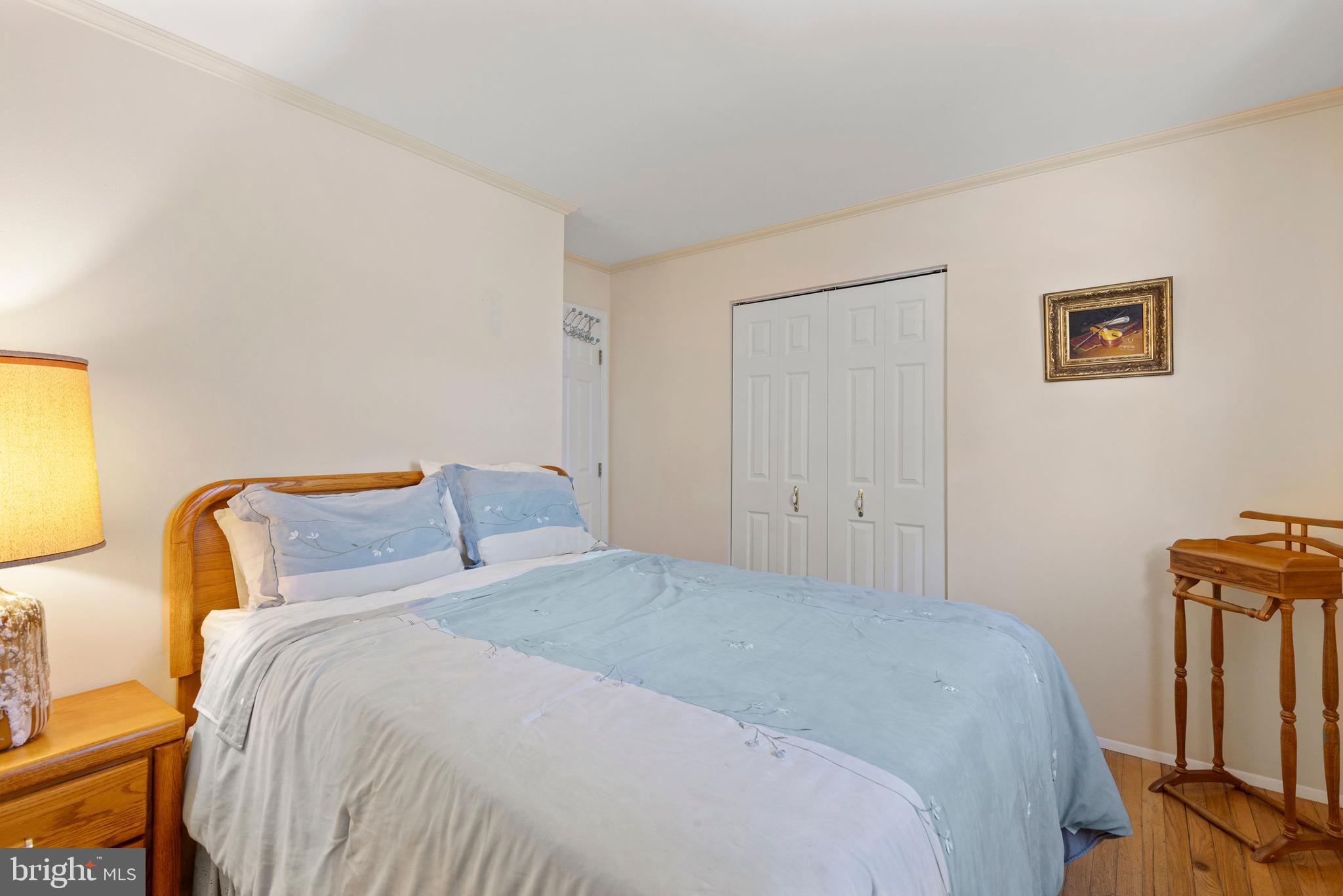 1008 Rosedale Avenue Baltimore, MD 21237 - Photo 20 of 45 a bedroom with a bed and a window