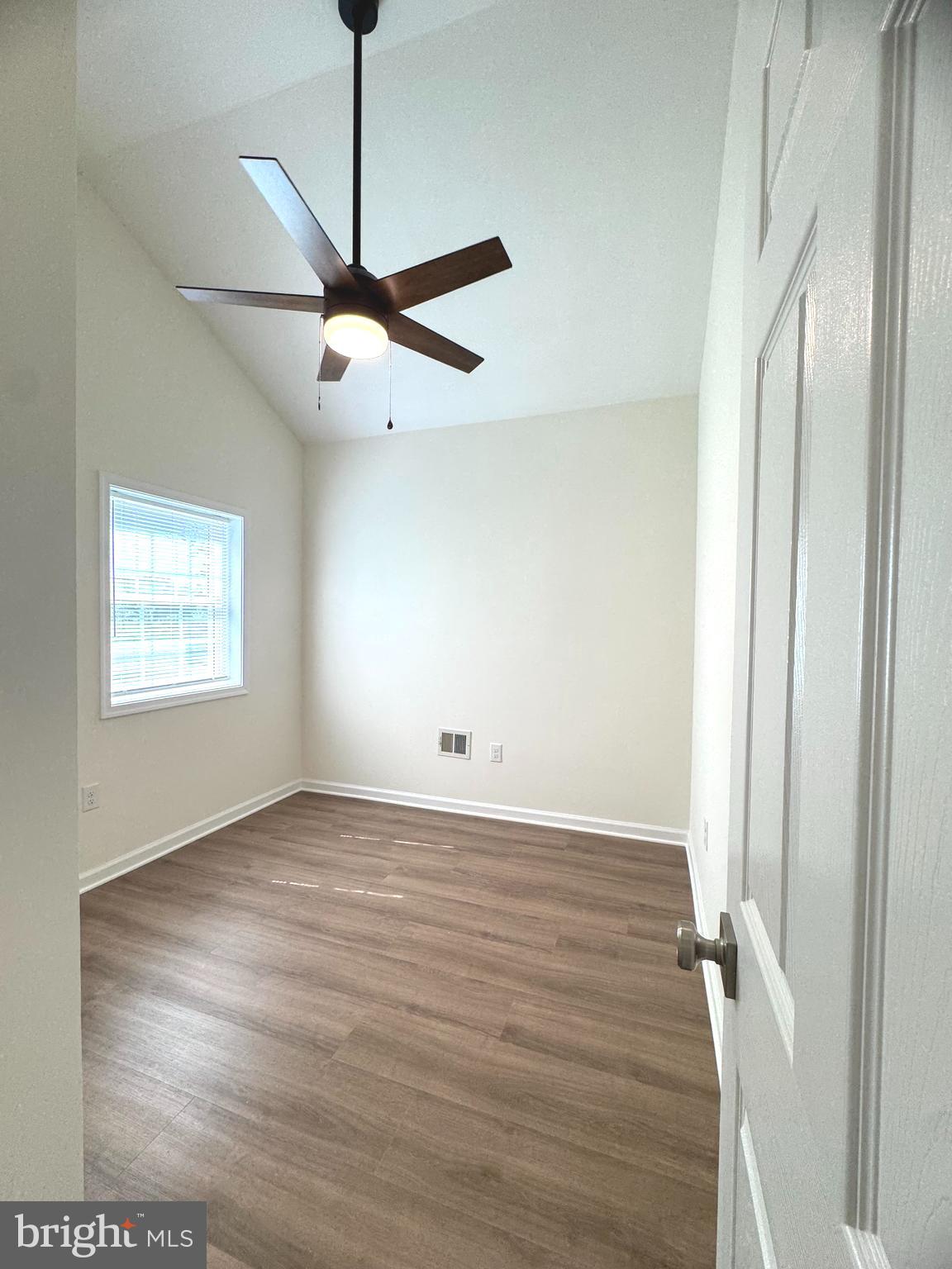 8190 Marshall Corner Road Pomfret, MD 20675 - Photo 14 of 28 a view of an empty room with a window
