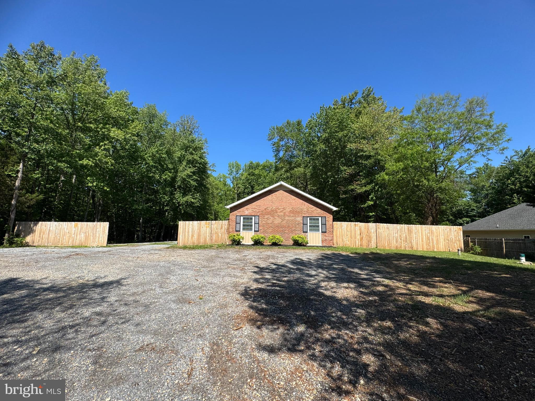 8190 Marshall Corner Road Pomfret, MD 20675 - Photo 22 of 28 a view of a house with a yard and large tree
