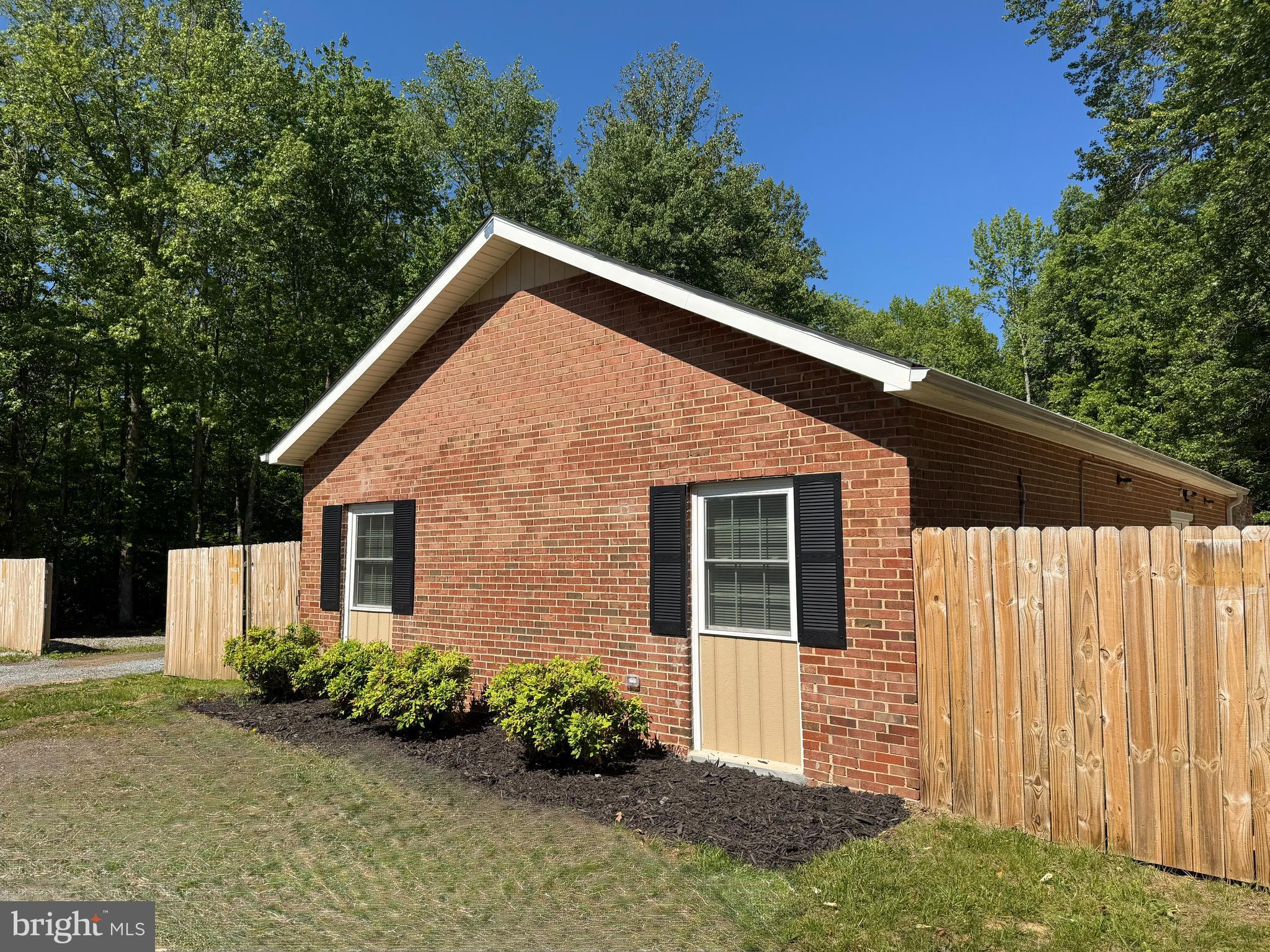8190 Marshall Corner Road Pomfret, MD 20675 - Photo 23 of 28 a front view of a house with garden