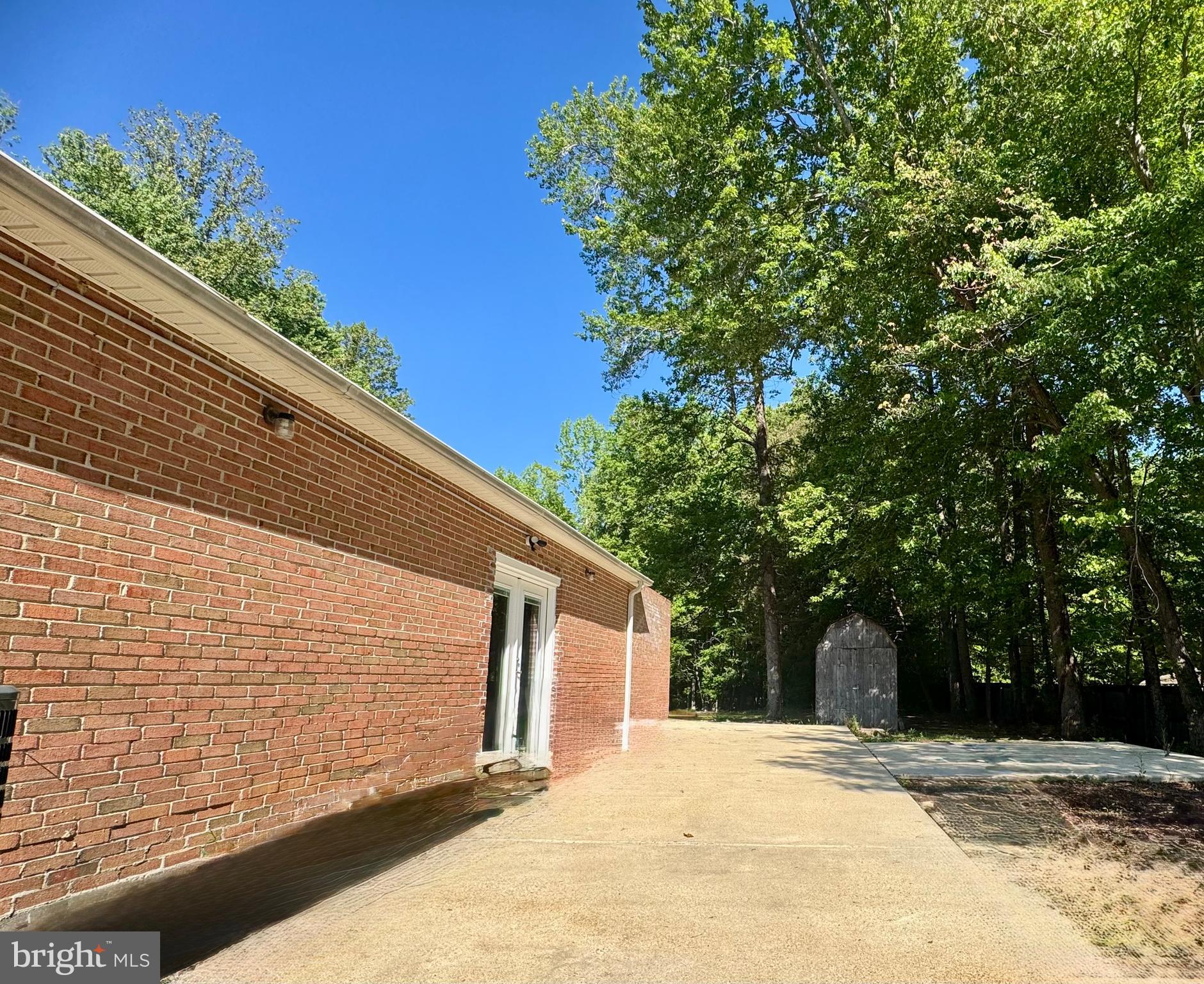 8190 Marshall Corner Road Pomfret, MD 20675 - Photo 25 of 28 a view of a backyard of the house