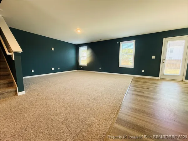 a view of a livingroom with a staircase