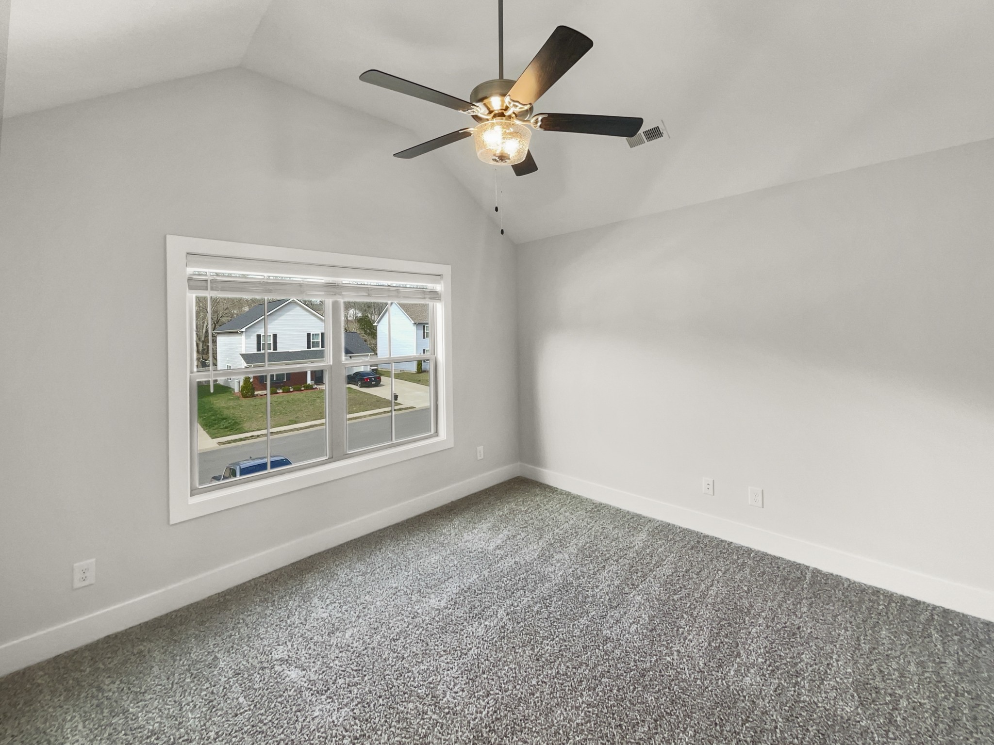 1672 Rains Road Clarksville, TN 37042 - Photo 11 of 23 an empty room with window and a ceiling fan