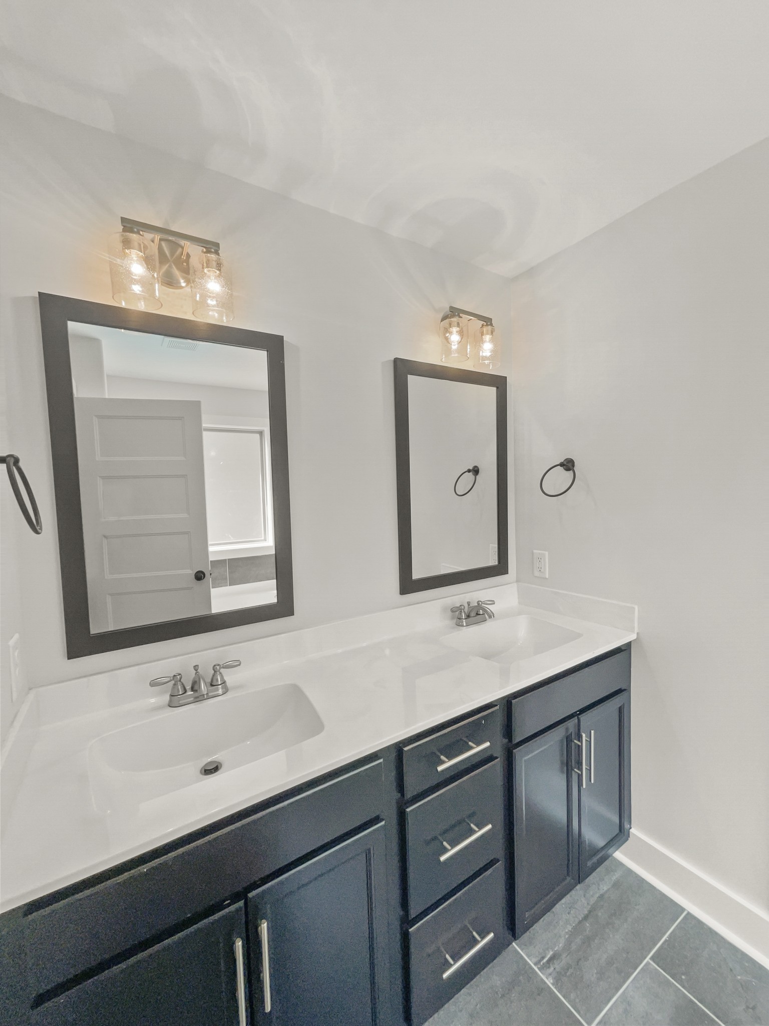 1672 Rains Road Clarksville, TN 37042 - Photo 15 of 23 a bathroom with a sink vanity and mirror
