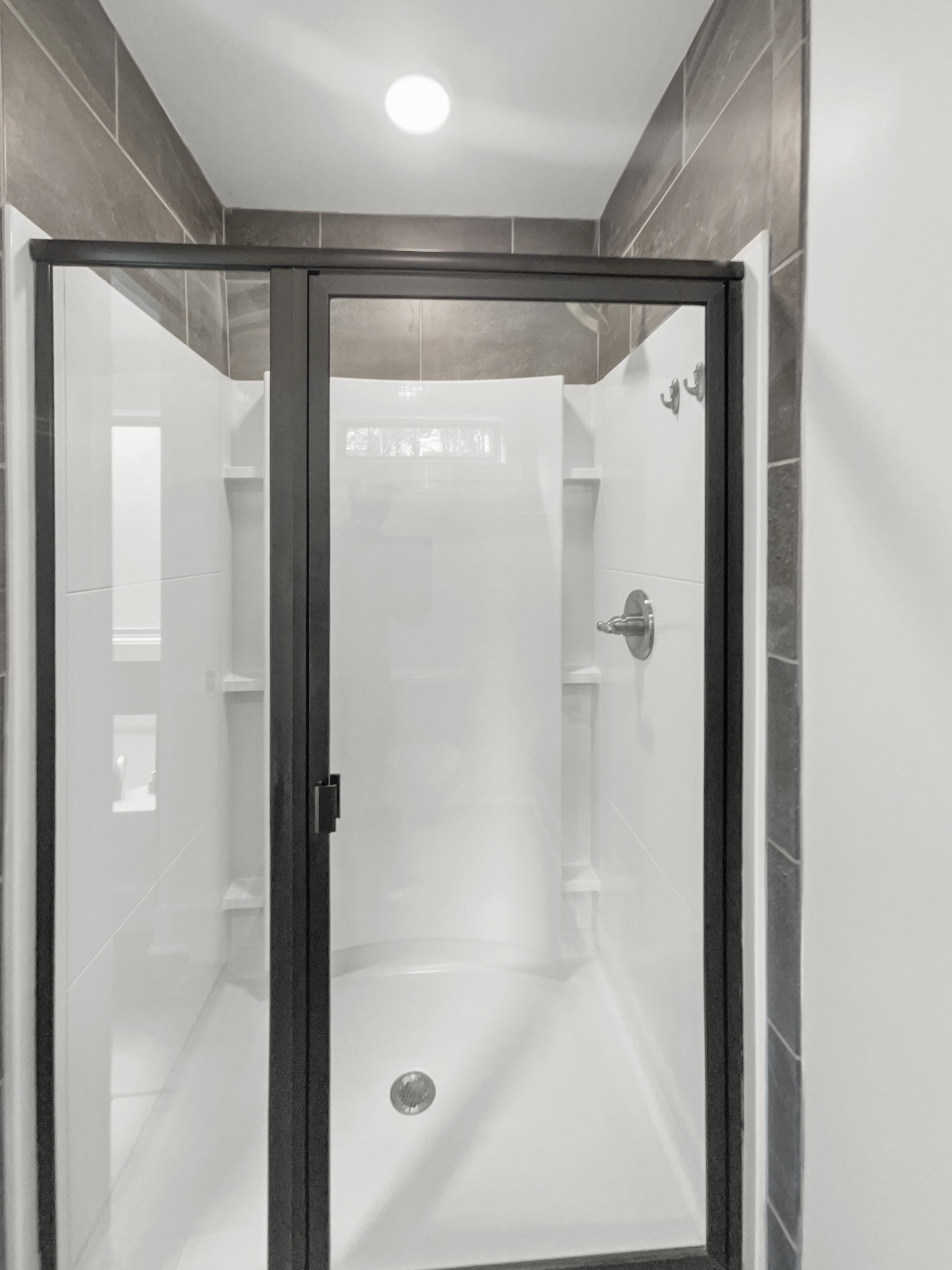 1672 Rains Road Clarksville, TN 37042 - Photo 17 of 23 a bathroom with a glass shower door