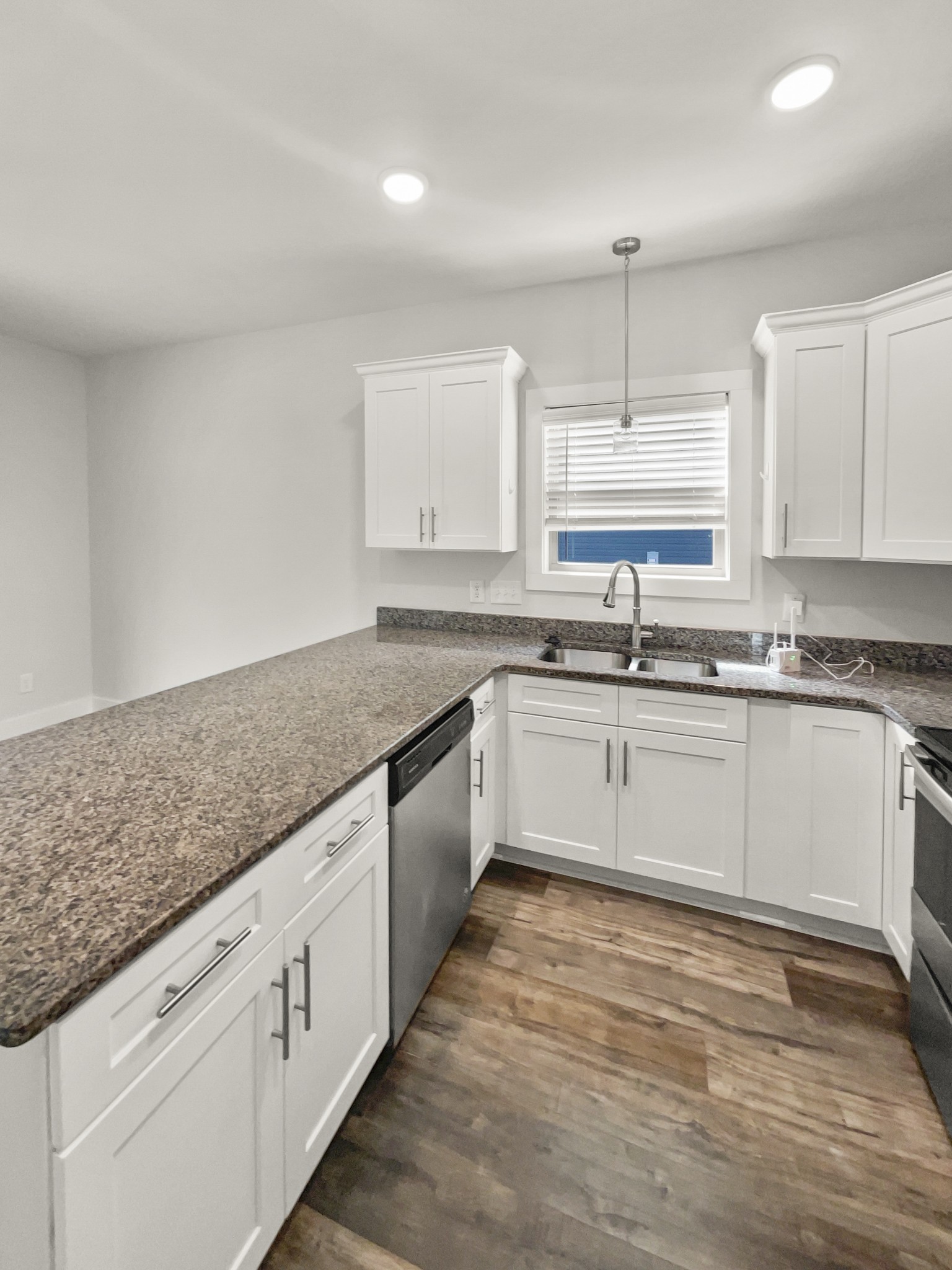 1672 Rains Road Clarksville, TN 37042 - Photo 10 of 23 a kitchen with stainless steel appliances granite countertop a sink and cabinets