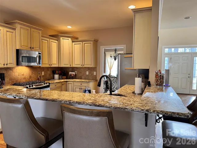 $630,000 | 5006 Shannamara Drive, Matthews, NC 28104