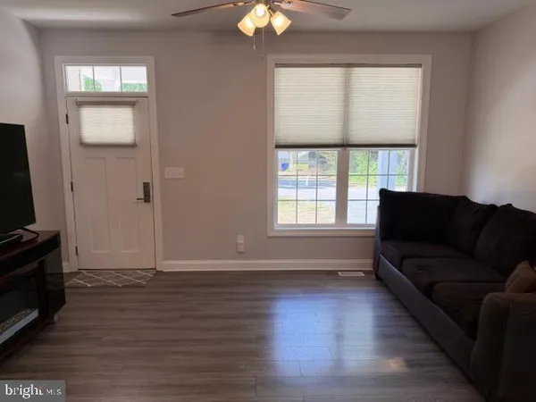 a living room with furniture and a couch