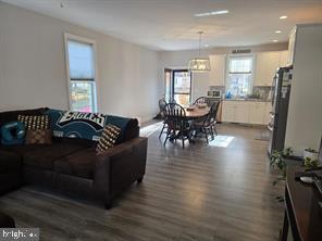 209 3rd Street Crumpton, MD 21628 - Photo 19 of 108 a living room with furniture wooden floor and a dining table
