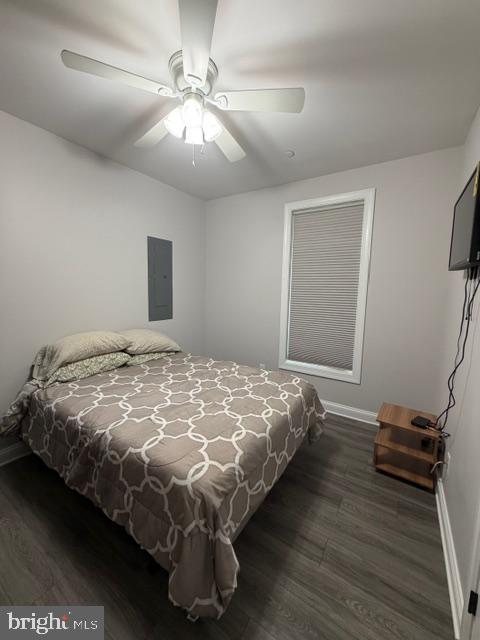 209 3rd Street Crumpton, MD 21628 - Photo 22 of 47 a bedroom with a bed and a ceiling fan