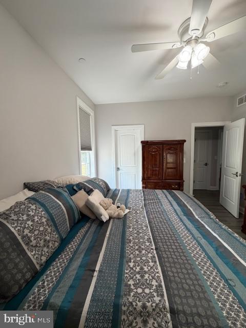 209 3rd Street Crumpton, MD 21628 - Photo 28 of 47 a bedroom with bed and a couch