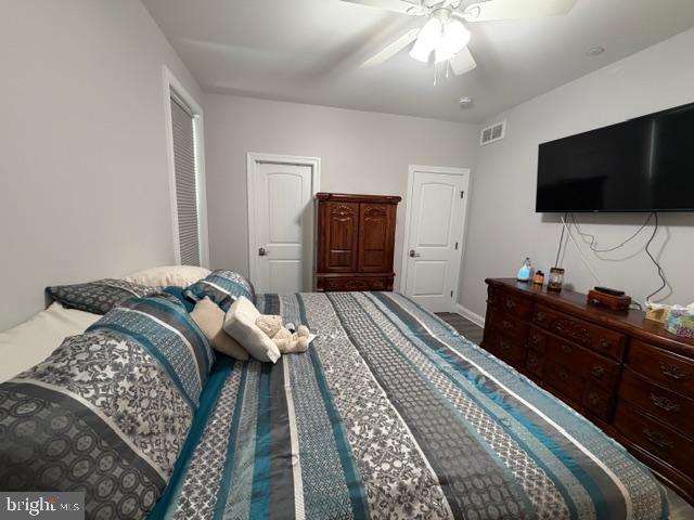 209 3rd Street Crumpton, MD 21628 - Photo 29 of 47 a bedroom with a bed and a flat screen tv